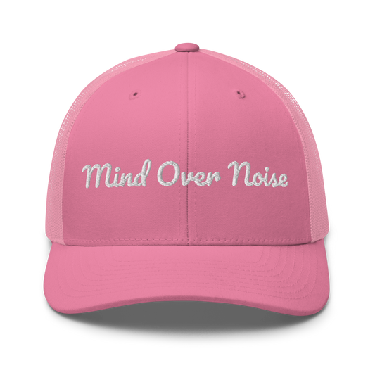 Pink cap with 'Mind Over Noise' text on a white background